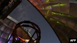 This NASA photo released on March 11, 2021 shows the view from inside the dome of NASA’s Infrared Telescope Facility as the 3.2-meter telescope atop Hawaii’s Mauna Kea will be used to measure the infrared spectrum of asteroid 2001 FO32. 