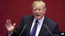 U.S. President Donald Trump delivers a speech at the National Assembly in Seoul, South Korea, Nov. 8, 2017. 