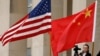 FILE - U.S. and Chinese flags fly at the Pentagon in Arlington, Virginia, November 9, 2018.