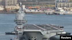 中國自主建造的第一艘航空母艦山東號於2019年11月14日駛離遼寧省大連港口，進行第九次試航。