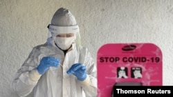 Spread of the coronavirus disease (COVID-19), in Trencin, Slovakia where more than 40,000 medics, troops, administrative personnel and volunteers fanned across 5,000 testing sites over the weekend.