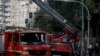 Firemen work at the area where an explosive device went off outside Greece's labour ministry in Athens, Greece, Feb. 3, 2024. 