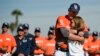 Baseball Coach Killed With Bryant Honored at Team's Opener