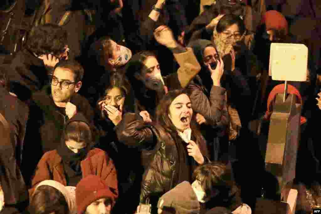 Iranian students chant slogans as they demonstrate following a tribute to victims of a Ukraine International Airlines crash, in front of the Amirkabir University in Tehran, Jan. 11, 2020.