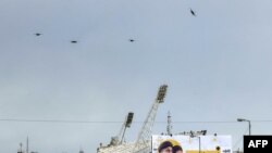 TOPSHOT - Israeli Air Force F-15 and F-35 fighter aircraft fly over Camille Chamoun Sports City Stadium on the outskirts of Beirut on February 23, 2025 during the funeral of slain Hezbollah leaders Hassan Nasrallah and Hashem Safieddine.TOPSHOT - Israeli Air Force F-15 and F-35 fighter aircraft fly over Camille Chamoun Sports City Stadium on 