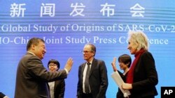 世卫组织结束在中国武汉的新冠病毒朔源调查后召开新闻发布会。（美联社照片）