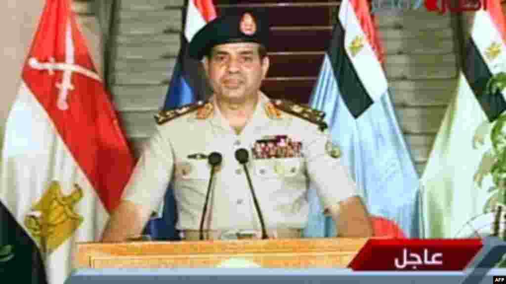 Egyptian Defense Minister Abdelfatah al-Sissi delivering a statement as the army unveils a roadmap for Egypt's political future, July 3, 2013. (Egyptian TV photo)