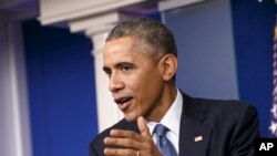 FILE - President Barack Obama speaks during a news conference in the Brady Press Briefing Room of the White House in Washington, Dec. 19, 2014.