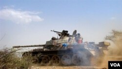 Pasukan Yaman dalam pertempuran dengan pemberontak Houthi.