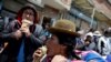 Partidarios del candidato presidencial del MAS, Luis Arce, celebran en El Alto, Bolivia, el lunes 20 de octubre de 2020.