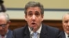 Michael Cohen, the former personal attorney of U.S. President Donald Trump, reads his opening statement as he testifies at a House Committee on Oversight and Reform hearing on Capitol Hill in Washington, Feb. 27, 2019. 