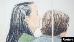FOTO ARSIP: CFO Huawei, Meng Wanzhou (kiri), yang ditangkap dengan jaminan ekstradisi, tampil di Pengadilan Tinggi British Columbia untuk mendengarkan sidang jaminan pembebasannya sebagai tampak dalam gambar artis di Vancouver, British Columbia, Kanada, 10 Desember 2018 (foto: Re