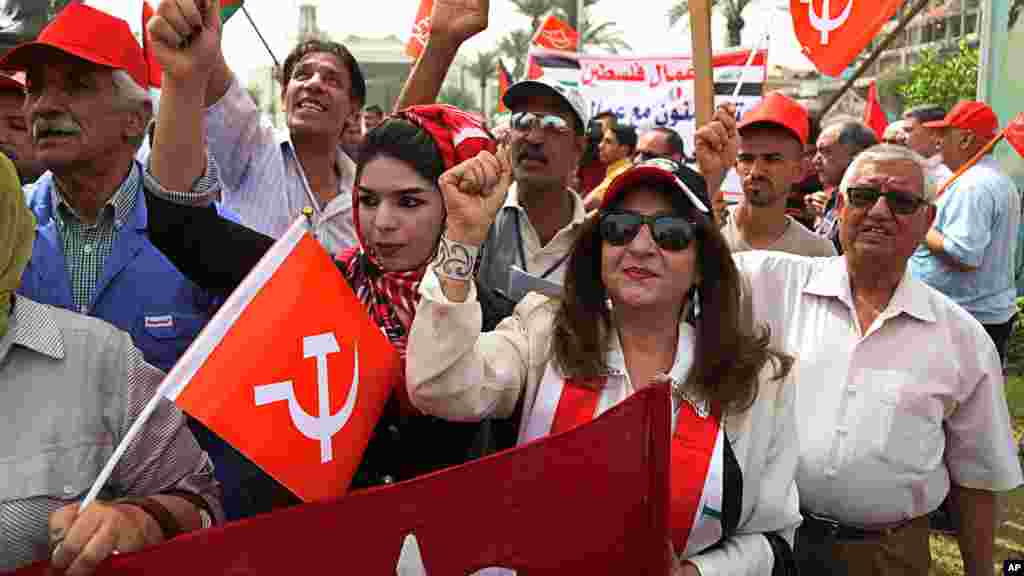 Ma'aikata a babban birnin Baghdad, ranar 1 daga watan Mayu, Shekarar 2017. 