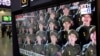 FILE - Layar TV di Stasiun Kereta Api Seoul di Seoul, Korea Selatan, menunjukkan gambar arsip tentara Korea Utara dalam sebuah program berita, Jumat, 18 Oktober 2024. (Ahn Young-joon/AP)