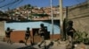 Miembros de la Fuerza de Acción de la Policía Nacional, o FAES, patrullan el barrio Antimano de Caracas. Enero 29 de 2019.