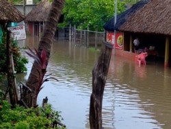 Otra vista de las inundaciones por el desbordamiento del río Los Esclavos, Chiquimulilla, Santa Rosa. Foto cortesía de @ConredGuatemala.