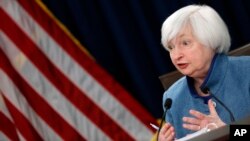 Federal Reserve Board Chair Janet Yellen answers a reporter's question during a news conference about the Federal Reserve's monetary policy, Dec. 14, 2016, in Washington. 