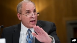 FILE - Former U.S. Border Patrol Chief Mark Morgan testifies before the Senate Homeland Security and Governmental Affairs Committee's hearing on 'Unprecedented Migration at the U.S. Southern Border, April 4, 2019.