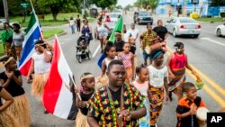 Défilé, à Flint, Michigan, le 19 juin 2018, à l'occasion de la fête qui commémore la fin de l'esclavage aux États-Unis, Il y a 155 ans, (Jake May / The Flint Journal via AP, archives)