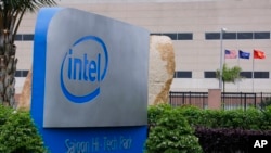 FILE - The logo of Intel Corp. is set up at its assembly and test facility at Saigon High Tech Park, Ho Chi Minh City, Vietnam.