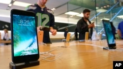 FILE - The Apple iPhone 7 is displayed at an Apple store at the Grove in Los Angeles, California, Sept. 16, 2016.