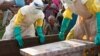 FILE - A mother of a child, suspected of dying from Ebola, cries near her child's coffin in Beni, North Kivu Province of Democratic Republic of Congo, Dec.17, 2018