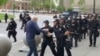 2 Buffalo Police Officers Charged With Assault in Shoving Incident