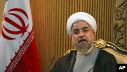 FLE - Iranian President Hassan Rouhani briefs media prior to departing Mehrabad airport to attend the United Nations General Assembly, in Tehran, Iran. 