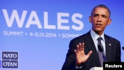 Presiden AS Barack Obama berbicara dalam KTT NATO di Resor Celtic Manor, Newport, Wales (5/9/2014).