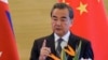 Menteri luar negeri China Wang Yi berbicara kepada media mengenai Korea Utara di Beijing, Kamis (7/9). 