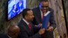 የቀድሞ ጠ/ሚኒስትር አቶ ኃይለማርያም ደሳለኝ እና አዲሱ ጠ/ሚኒስትት ዶ/ር አብይ አሕመድ 