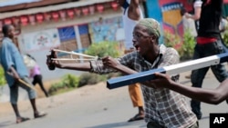 Un manifestant dans le quartier de Cibitoke, Bujumbura, 29 mai 2015