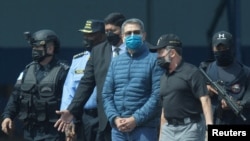 El presidente de Honduras, Juan Orlando Hernández, fue extraditado a Nueva York el 21 de abril de este año después de agotar todas las instancias judiciales en su país ante el pedido hecho al Estado hondureño por el Departamento de Justicia de Estados Unidos. (Foto VOA / Archivo)