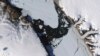 Warming-Stoked Tides Eating Huge Holes in Greenland Glacier