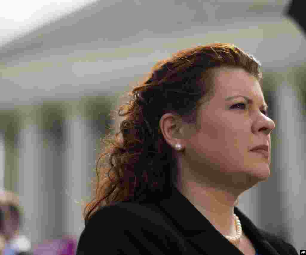 Lori Windham, the attorney representing Hobby Lobby, stands outside the Supreme Court following the decision on the Hobby Lobby case, in Washington, Monday, June 30, 2014.