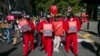 Des personnes protestent contre mégaprojet pétrolier en Afrique de l'Est lors d'une manifestation à New York, le 23 septembre 2022. Le projet prévu par TotalEnergies et la compagnie chinoise CNOOC est décrié par les activistes climatiques. AP / Ted Shaffrey
