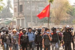 FILE - Protesters demonstrate against the military coup in Monywa, Sagaing region, in this photo taken and received from an anonymous source via Facebook on April 3, 2021.