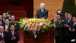 Newly re-elected Vietnam Communist Party General Secretary Nguyen Phu Trong, center, speaks at the closing ceremony of its five-yearly congress in Hanoi, Vietnam, Jan. 28, 2016. 