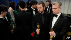Мстислав Чернов на Governors Ball з Кристофером Ноланом