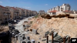 Travaux de construction, colonie de Modiin Illit, Cisjordanie, le 14 mars 2011.