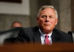 FILE - Senator Richard Burr, a Republican from North Carolina, is seen during a hearing on Capitol Hill in Washington, Sept. 5, 2018. Burr, too, reportedly dumped stocks following a COVID briefing.