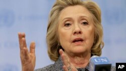 FILE - Hillary Rodham Clinton is seen speaking to reporters at United Nations headquarters in New York, March 10, 2015. 