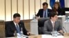 资料照：中国领导人习近平与加拿大总理特鲁多在日本大阪举行的G20峰会上。（2019年6月29日）