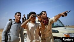 Des combattants libyens à Syrte, en mars 2015.