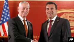 U.S. Defense Secretary James Mattis, left, shakes hands with Macedonian Prime Minister Zoran Zaev during their meeting in Skopje, Macedonia, Sept. 17, 2018. Zaev met with Vice President Mike Pence in Washington, Sept. 20, 2018.