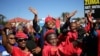 Supporters of various opposition parties gesture while calling for the removal of President Jacob Zuma outside the Constitutional Court in Johannesburg, South Africa, May 15, 2017. 