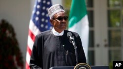 Le président nigérian Muhammadu Buhari s'exprime lors d'une conférence de presse avec le président Donald Trump dans le jardin des roses de la Maison Blanche à Washington, le 30 avril 2018.