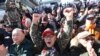 A South Korean Vietnam War veteran shouts during a rally to denounce the United States' demand for raising the defense costs for stationing U.S. troops in South Korea, near the U.S. embassy in Seoul, South Korea, Nov. 20, 2019.