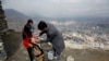 FILE - A boy receives polio vaccination drops during an anti-polio campaign in Kabul, Afghanistan, March 14, 2018.