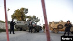 FILE - Israeli security forces near the West Bank city of Ramallah on February 26, 2016.